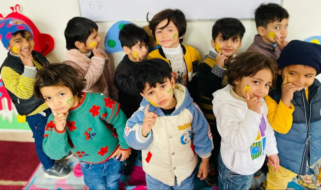 Young Nurture learners participating in a classroom activity