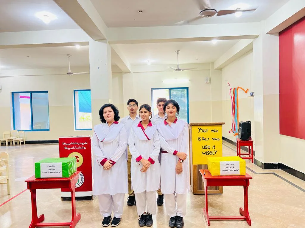 Students presenting practical science work in a laboratory setting