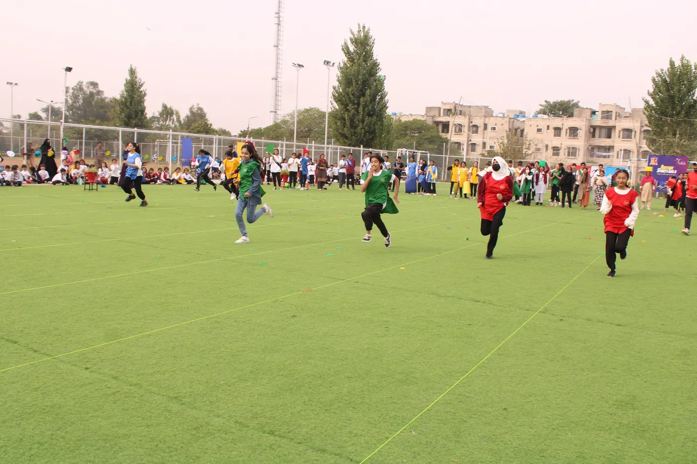 Students competing in a race during a school sports event